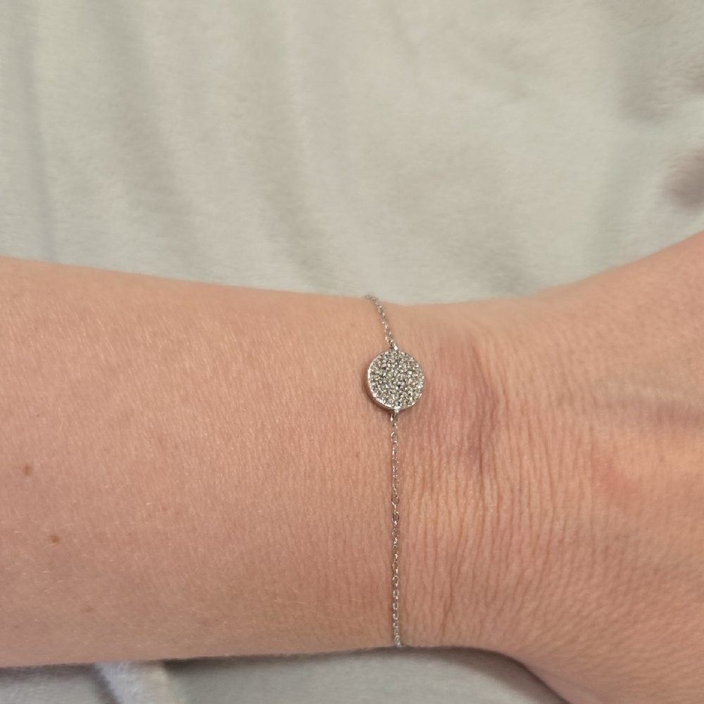 Nadri Elegant Silver Bracelet with Round Crystal Pendant